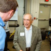 Seymour Padnos with guests at the Engineering Design Project Preview Event